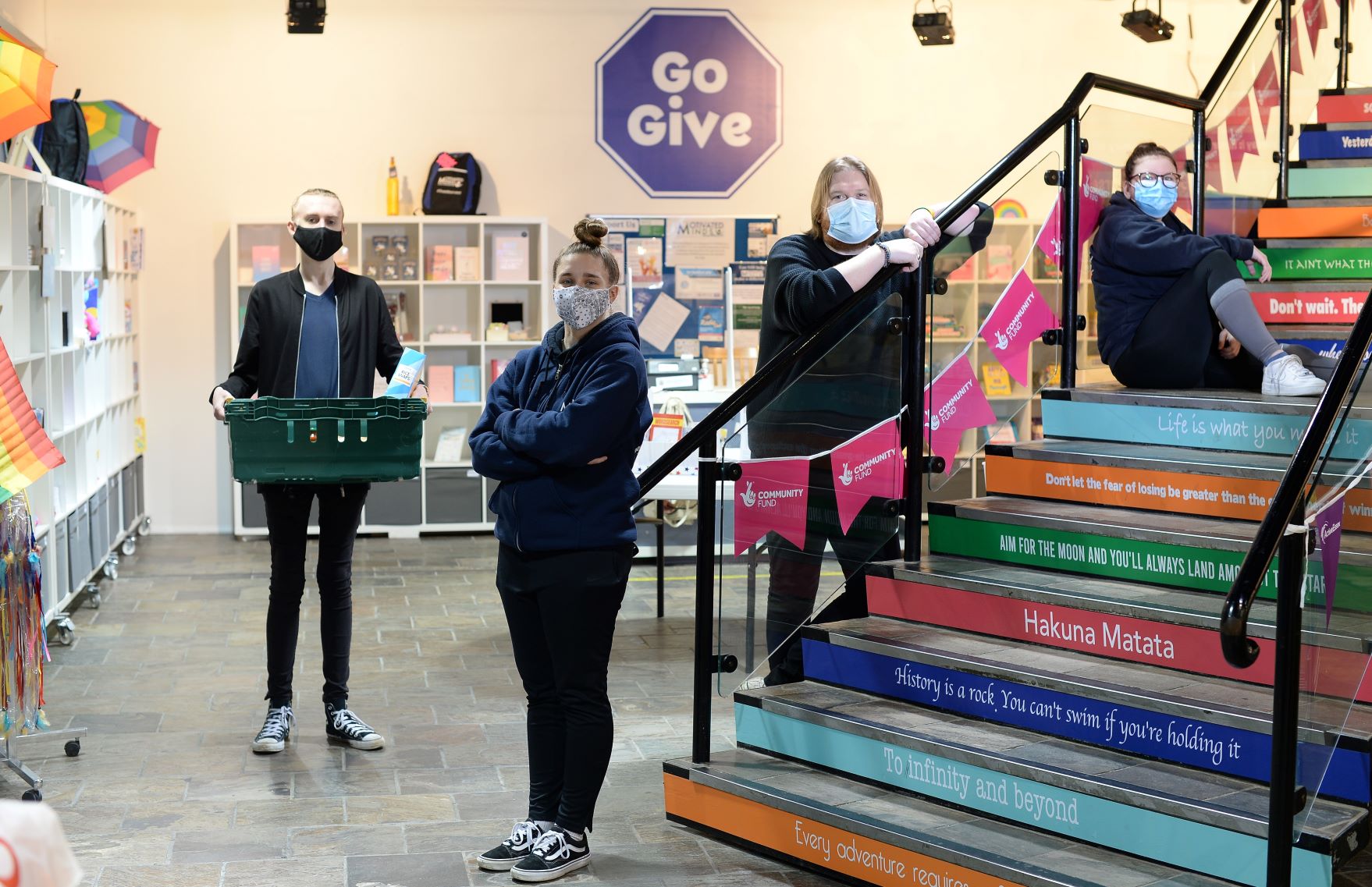 Four volunteers at the Happy Hub